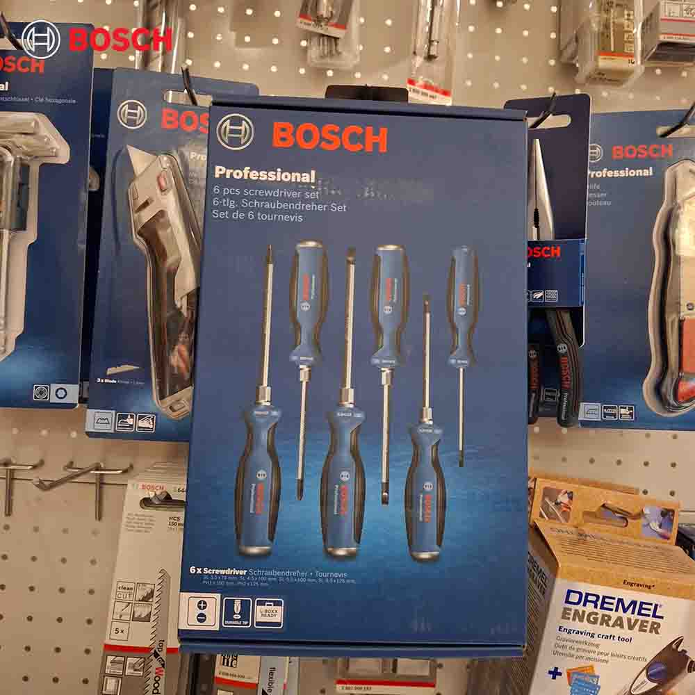 Bosch professional screwdriver set packaging on a store shelf with Bosch branding.