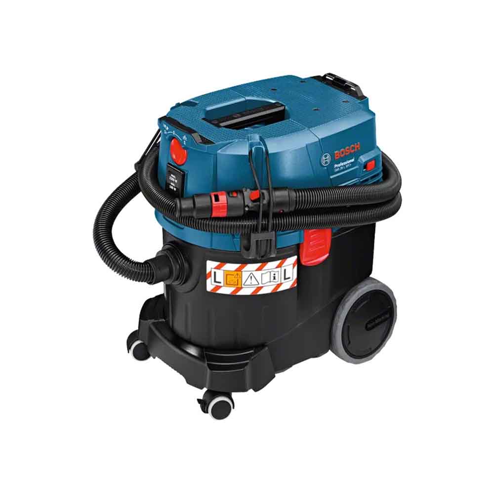 A blue and black Bosch vacuum cleaner model GAS 35L SFC+ with a transparent dust container and wheels for mobility.
