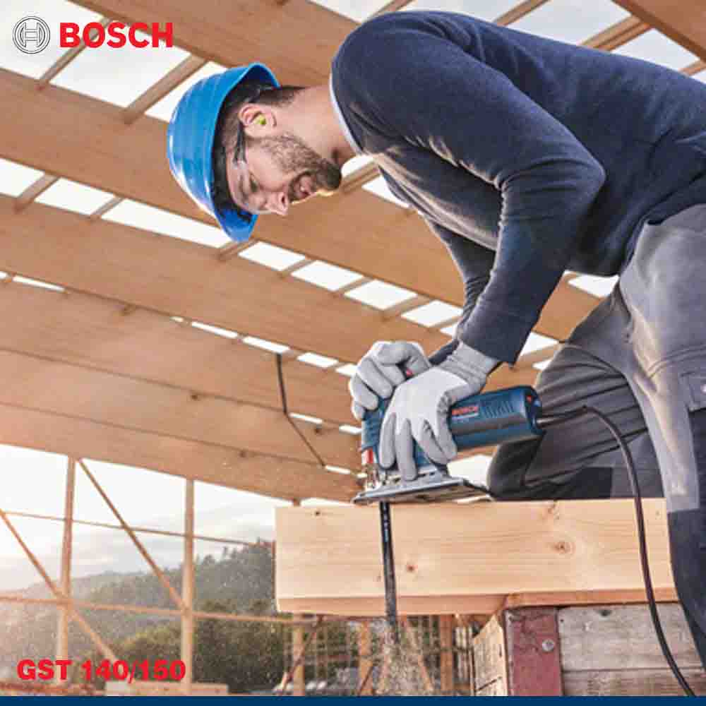Person using a Bosch power tool on a wooden structure