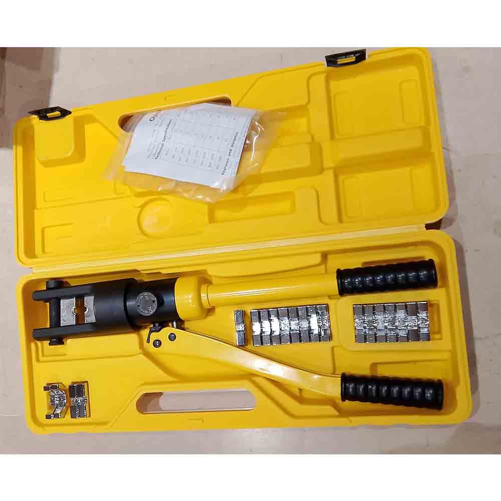 Yellow hydraulic crimping tool set with accessories on a light background