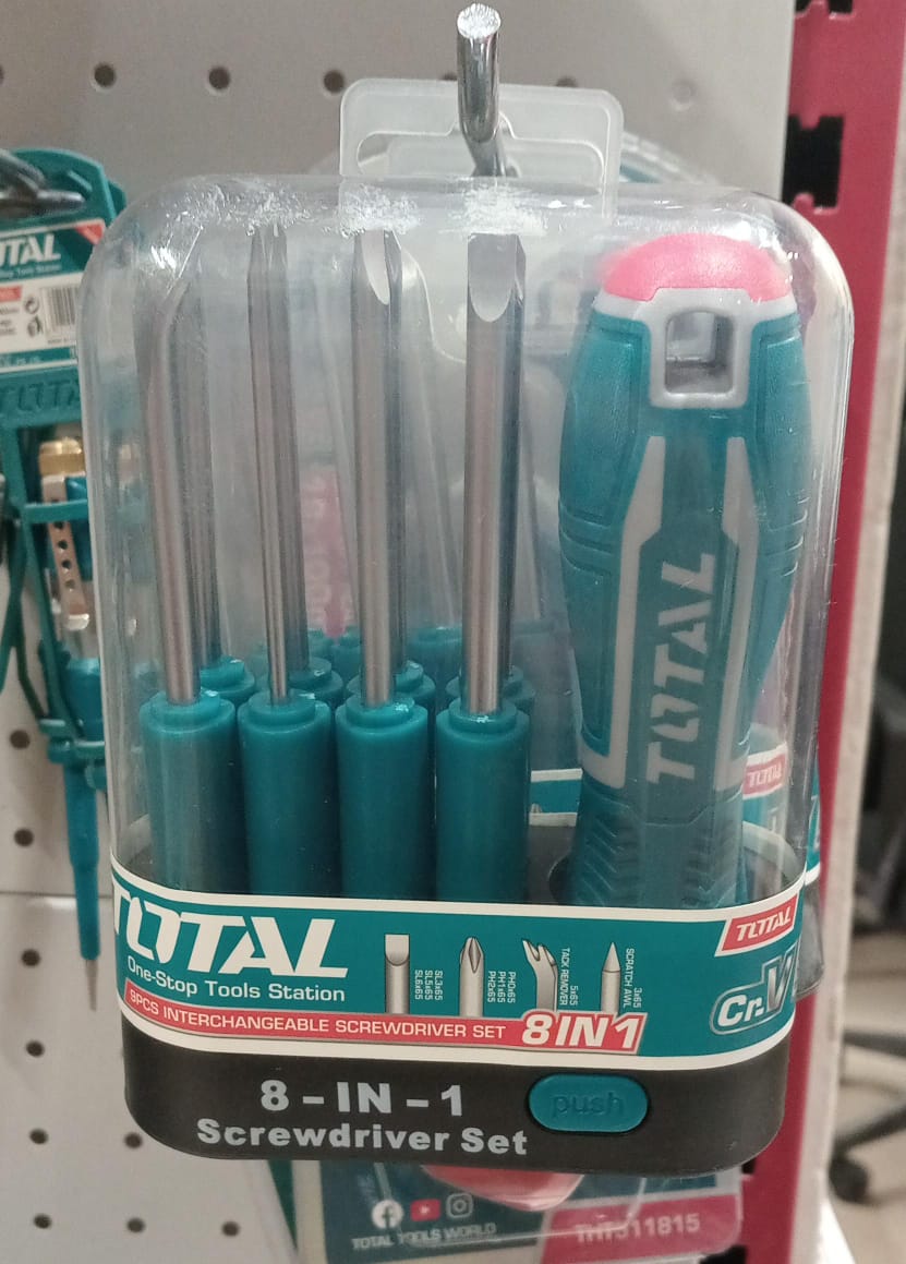 8-in-1 screwdriver set in clear packaging with Total branding on a store shelf.